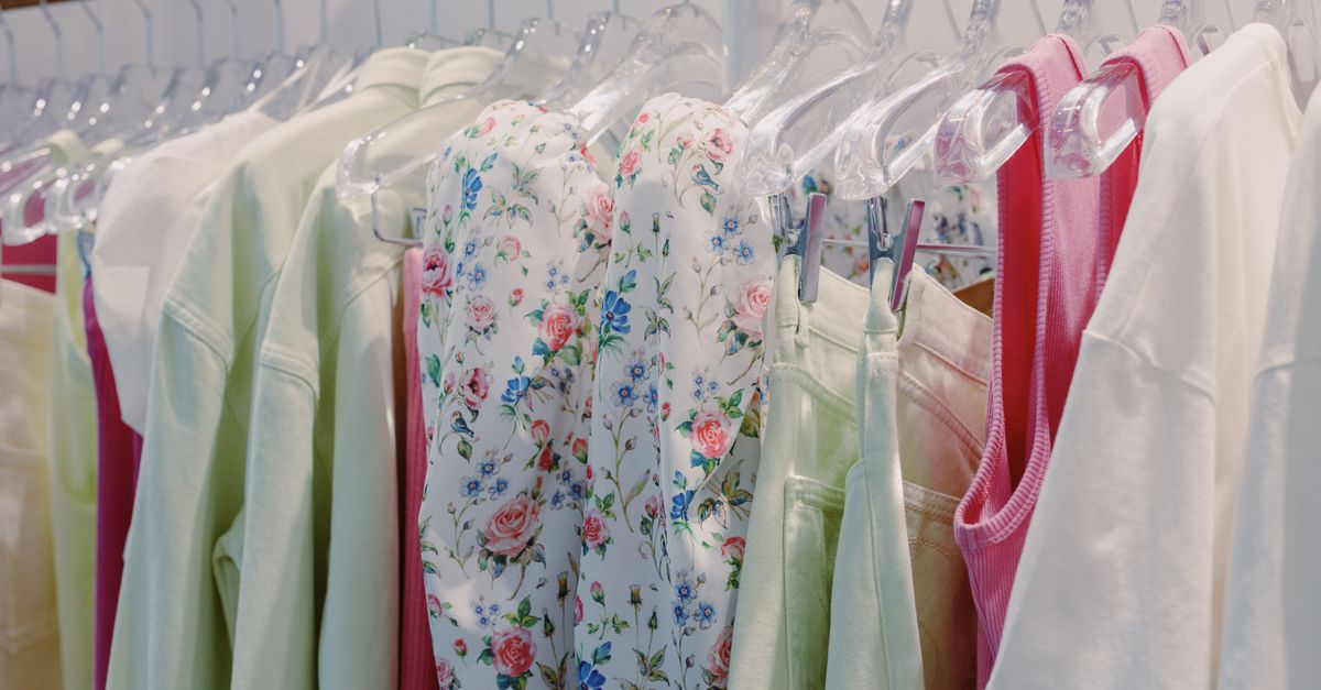 Vibrant selection of clothes on display in a modern boutique, showcasing fashion trends.
